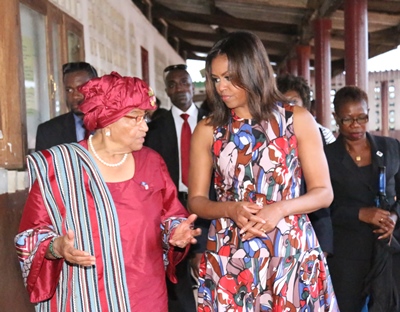 A walk with President Sirleaf at the R.S. Caulfield School